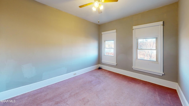 carpeted empty room with ceiling fan