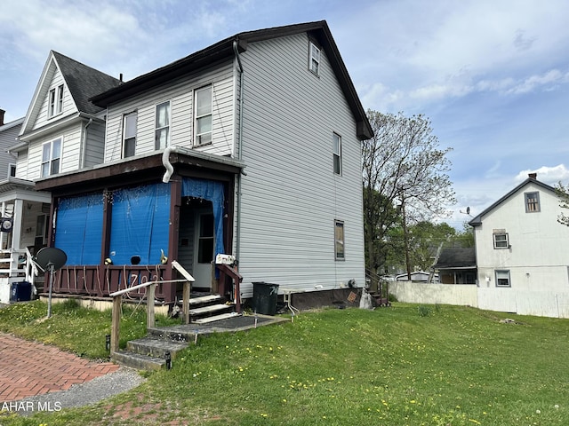 view of front of property with a front lawn