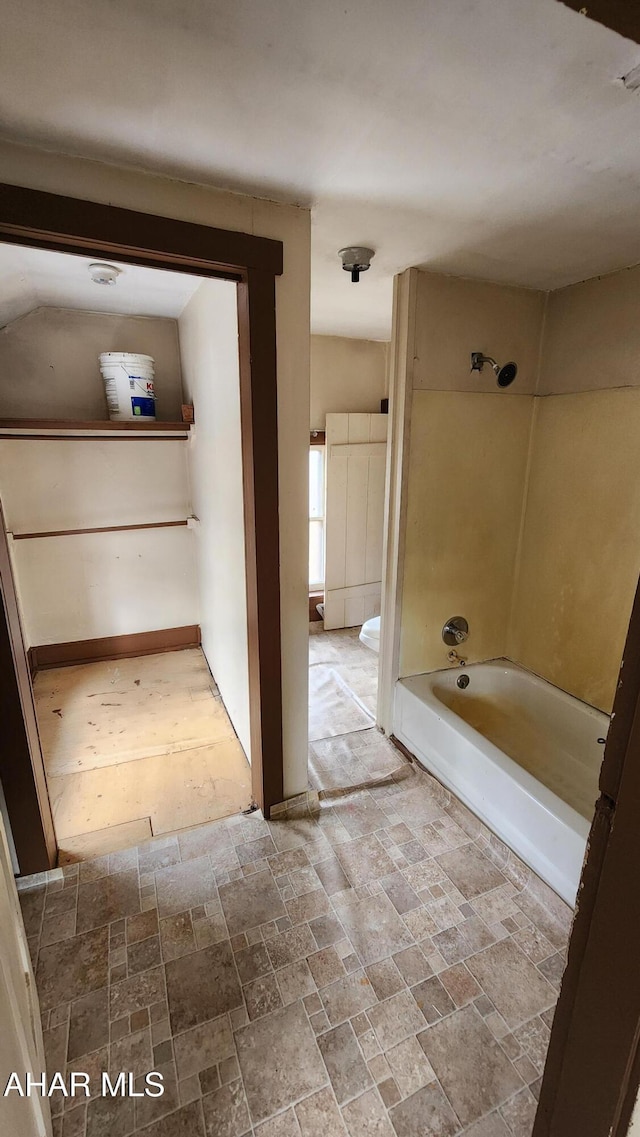 bathroom with shower / bathtub combination