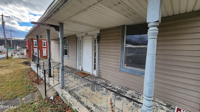 entrance to property with covered porch