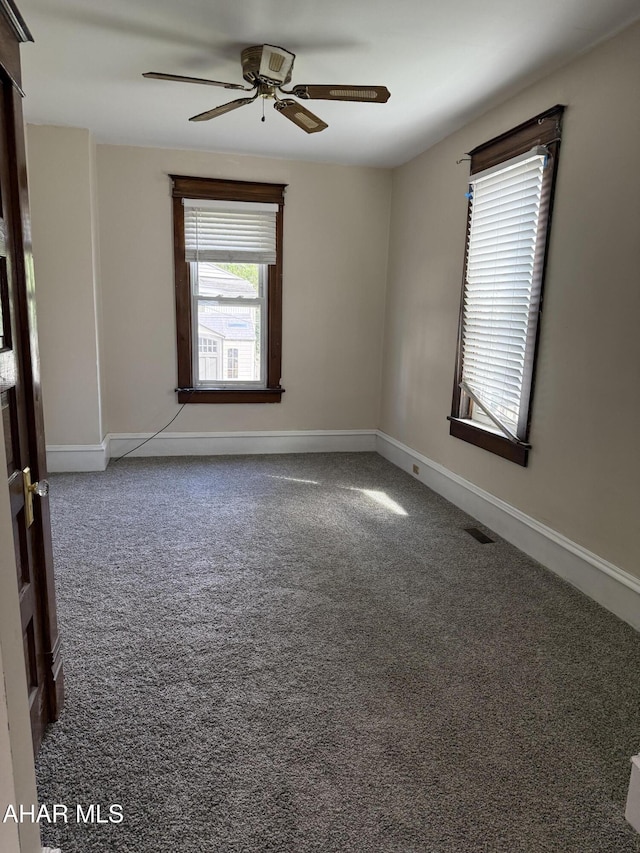 303 Cherry Ave, Altoona, PA 16601 - carpeted empty room with a ceiling fan and baseboards