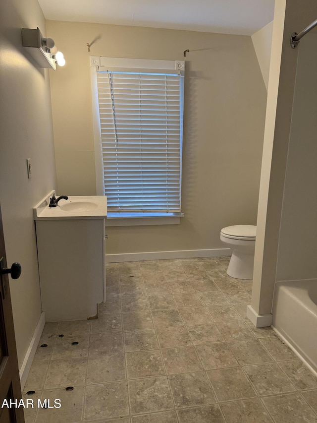303 Cherry Ave, Altoona, PA 16601 - bathroom with toilet, vanity, baseboards, a bathtub, and a shower