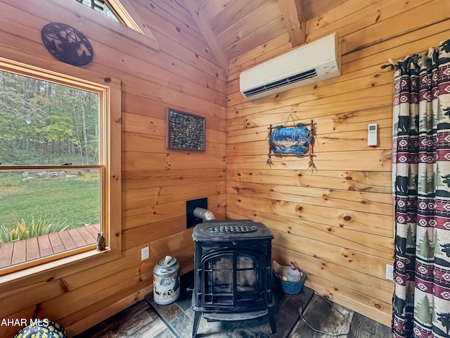 room details featuring a wood stove, wooden walls, and a wall unit AC