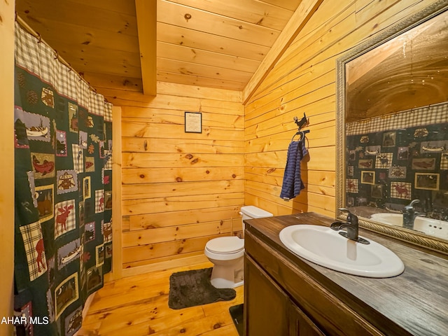 bathroom featuring vanity, wooden ceiling, vaulted ceiling, hardwood / wood-style flooring, and toilet