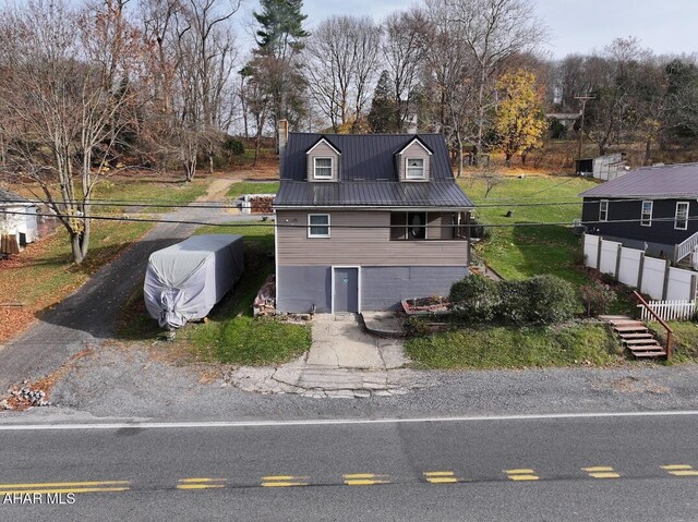 9802 Black Valley Rd, Everett, PA 15537 - view of side of home featuring a metal roof and view of wooded area
