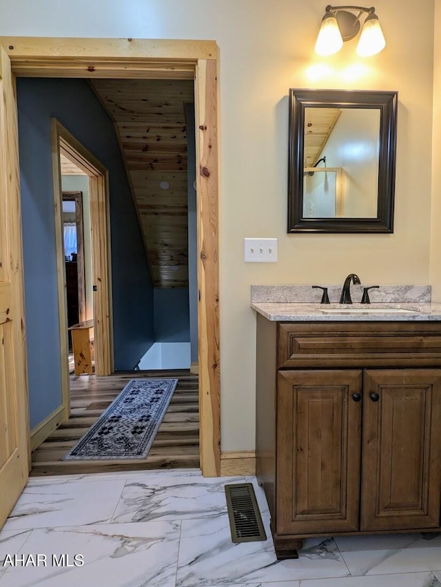 9802 Black Valley Rd, Everett, PA 15537 - bathroom with marble look tile flooring and vanity