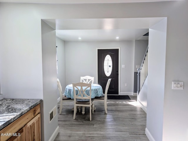 9802 Black Valley Rd, Everett, PA 15537 - dining room featuring light wood finished floors, recessed lighting, and stairway