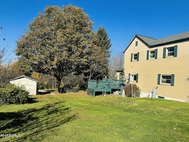 view of yard featuring a deck