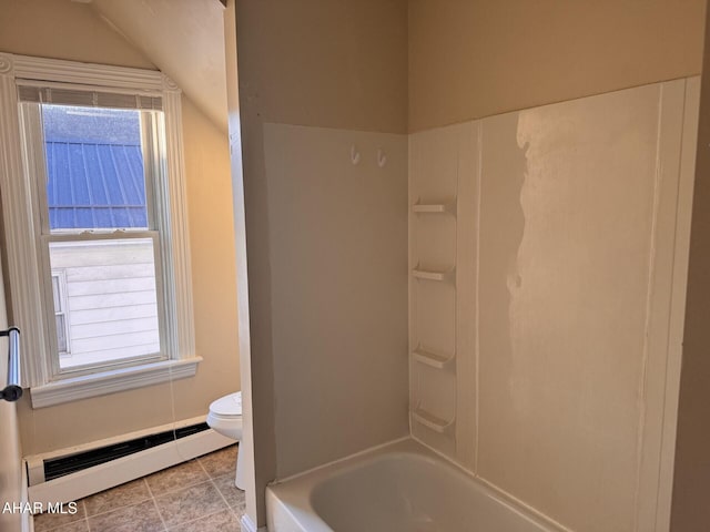 bathroom with tile patterned floors, toilet, bathing tub / shower combination, and a baseboard heating unit