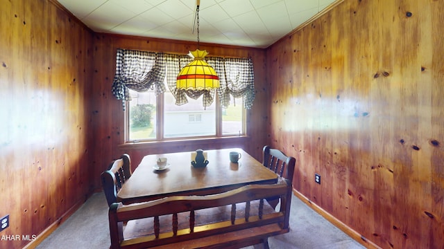 2513 Quail Ave, Altoona, PA 16602 - carpeted dining area featuring wooden walls and baseboards