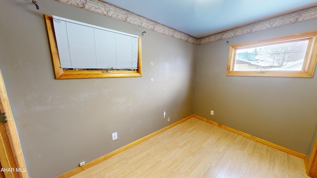 empty room featuring hardwood / wood-style floors