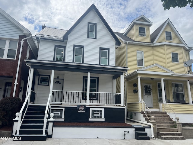 2602 W Chestnut Ave, Altoona, PA 16601 - view of front of house with covered porch and a metal roof