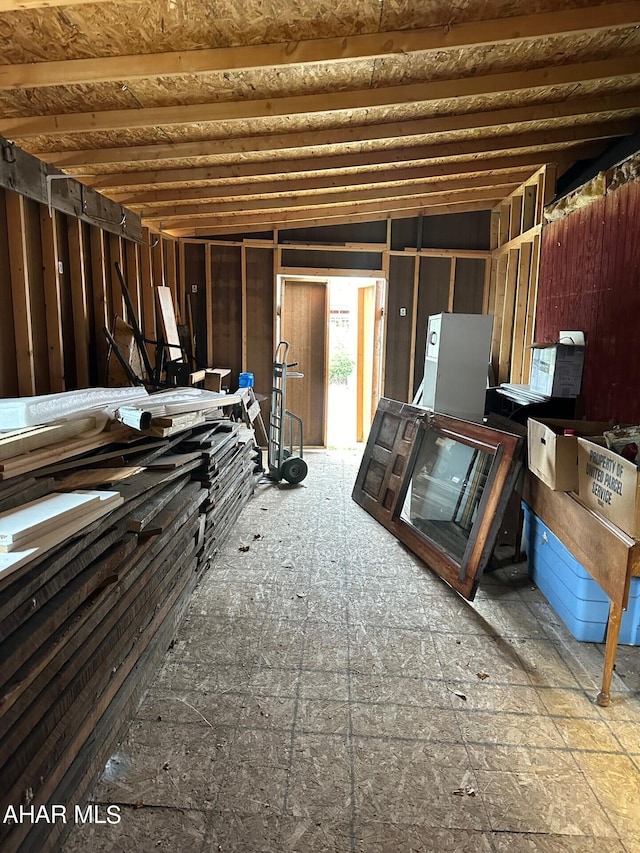 misc room featuring lofted ceiling