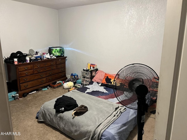 bedroom with light colored carpet