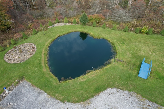 birds eye view of property featuring a water view