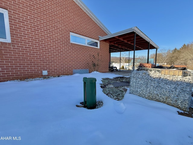 view of snow covered patio