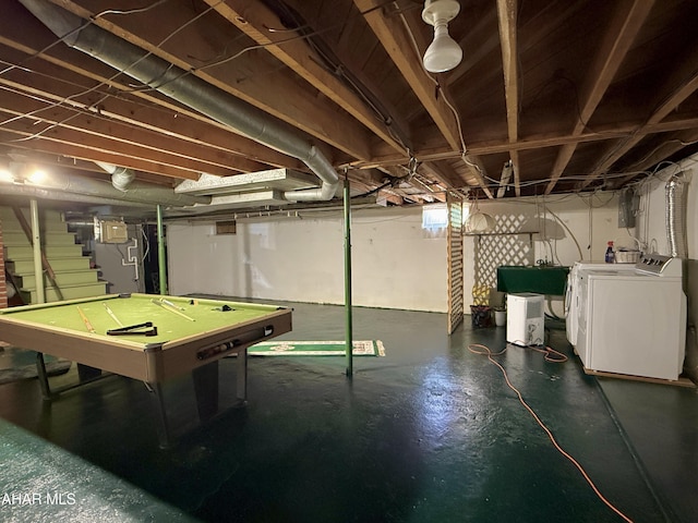 basement featuring pool table and washing machine and dryer