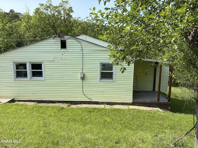 2900-08 2nd St, Altoona, PA 16601 - view of side of property featuring a lawn and a patio