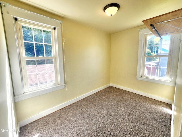 view of carpeted spare room