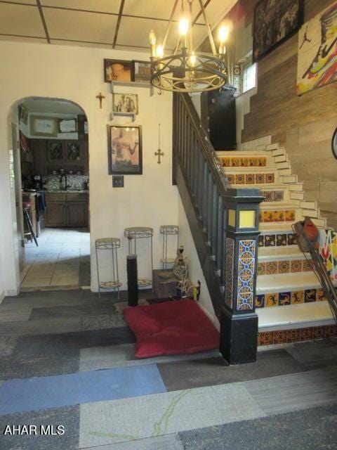 210 Hazel St, Johnstown, PA 15909 - stairway with arched walkways and a chandelier