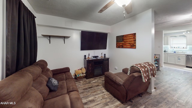1407 N 5th Ave, Altoona, PA 16601 - living area featuring ceiling fan and wood finished floors
