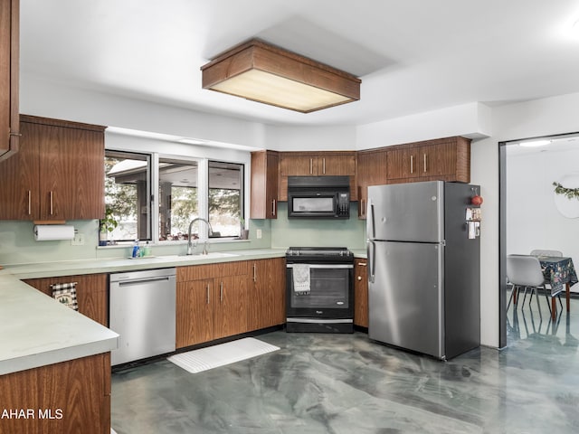 kitchen featuring appliances with stainless steel finishes and sink