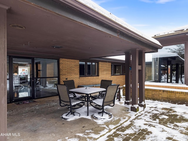 view of snow covered patio