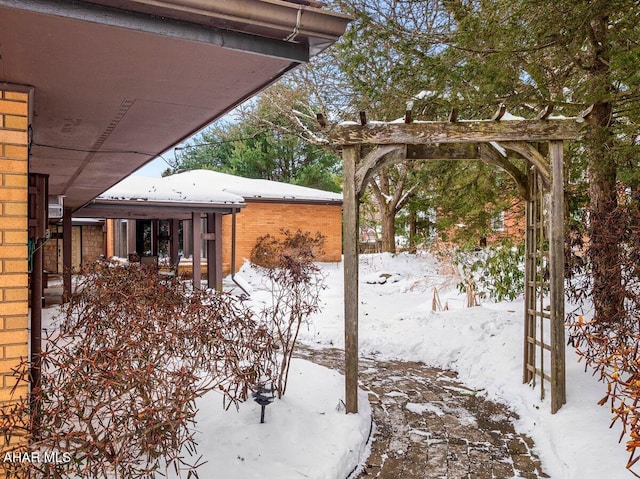 view of yard covered in snow