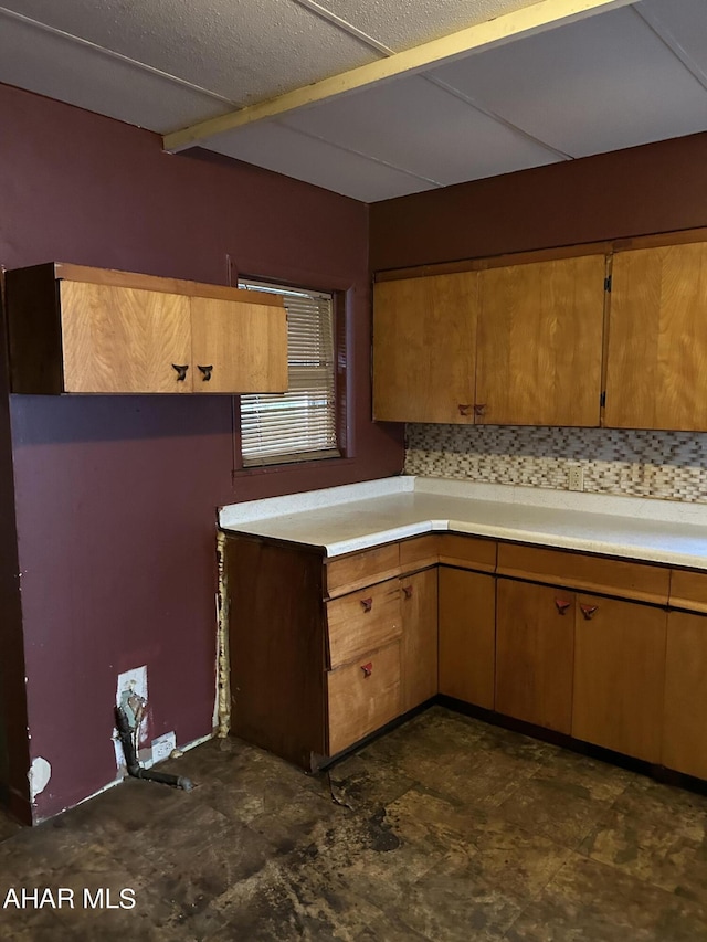 kitchen featuring backsplash