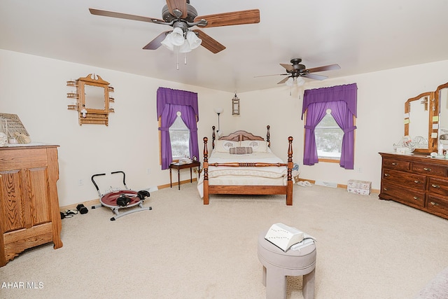 bedroom featuring ceiling fan and carpet floors