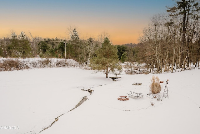 view of snow covered land