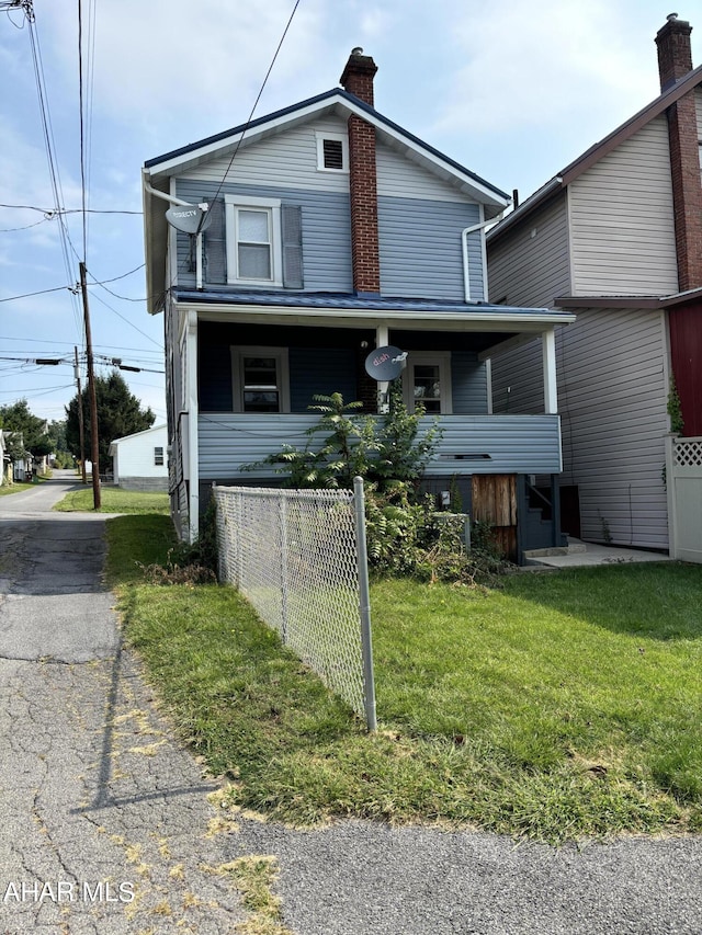 view of front property with a front lawn