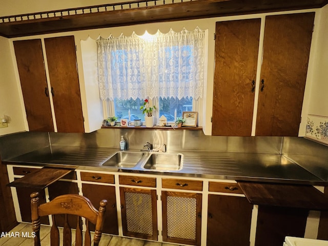 kitchen featuring stainless steel counters and sink