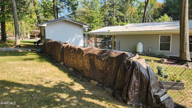 exterior space with a yard