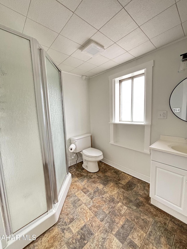 1413 17th Ave, Altoona, PA 16601 - full bath with vanity, a stall shower, a paneled ceiling, and stone finish flooring