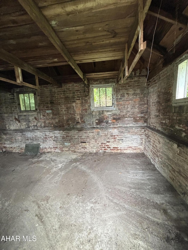1413 17th Ave, Altoona, PA 16601 - miscellaneous room featuring healthy amount of natural light and brick wall