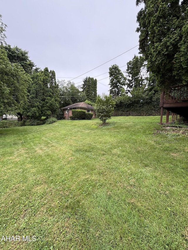 1413 17th Ave, Altoona, PA 16601 - view of grassy yard with a wooden deck