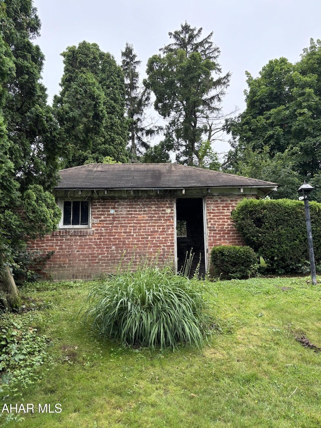 1413 17th Ave, Altoona, PA 16601 - view of property exterior with brick siding and a lawn