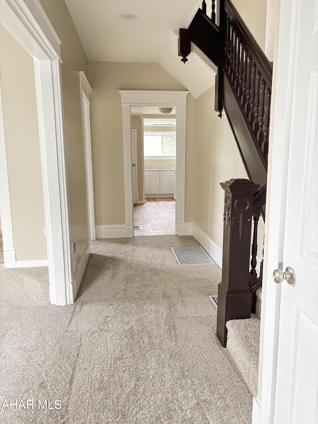 1413 17th Ave, Altoona, PA 16601 - corridor featuring carpet, lofted ceiling, and stairs