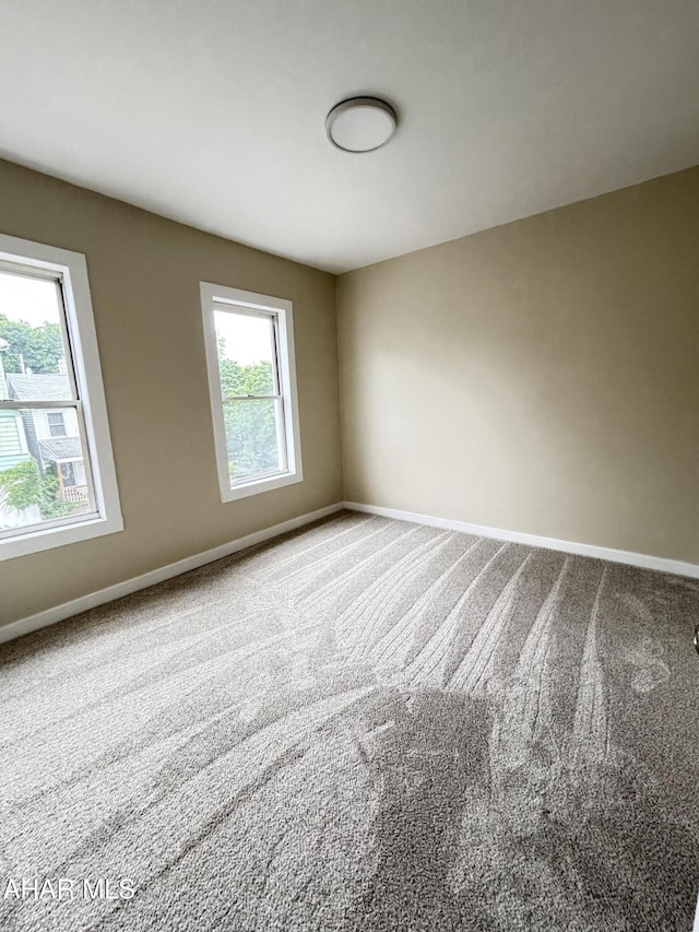 1413 17th Ave, Altoona, PA 16601 - unfurnished room with plenty of natural light and carpet