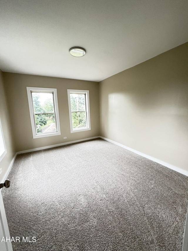 1413 17th Ave, Altoona, PA 16601 - empty room with carpet floors and baseboards