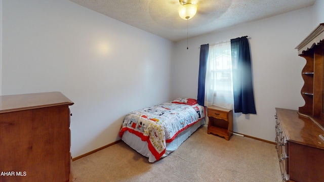 1647 Saint Francis Ln, Altoona, PA 16602 - carpeted bedroom with a textured ceiling and ceiling fan