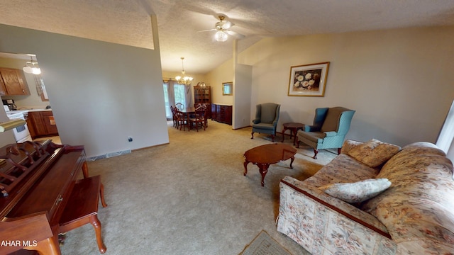 1647 Saint Francis Ln, Altoona, PA 16602 - living area with vaulted ceiling, a ceiling fan, light colored carpet, and a chandelier