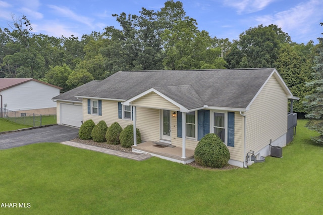 1647 Saint Francis Ln, Altoona, PA 16602 - view of front of home with covered porch, roof with shingles, a garage, and asphalt driveway