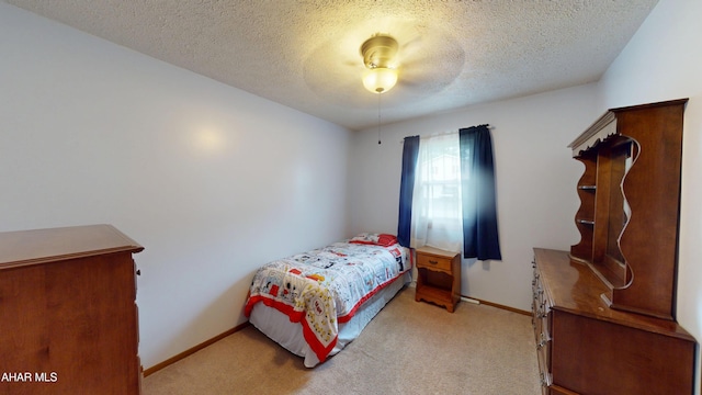1647 Saint Francis Ln, Altoona, PA 16602 - bedroom featuring light colored carpet, a textured ceiling, and ceiling fan