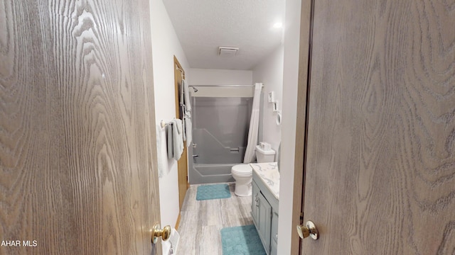 1647 Saint Francis Ln, Altoona, PA 16602 - bathroom with vanity, wood finished floors, bathing tub / shower combination, and a textured ceiling