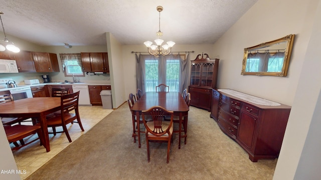 1647 Saint Francis Ln, Altoona, PA 16602 - dining area with a chandelier, a textured ceiling, and healthy amount of natural light