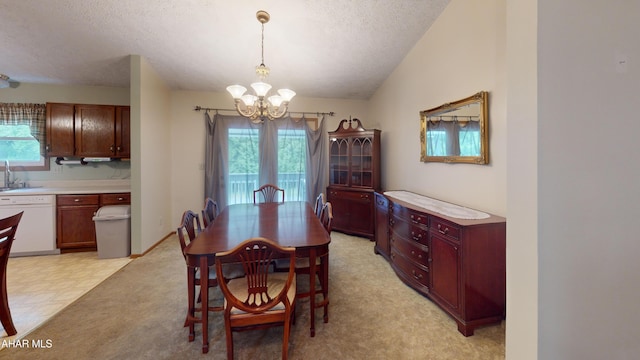 1647 Saint Francis Ln, Altoona, PA 16602 - dining area with a chandelier, a textured ceiling, and light floors