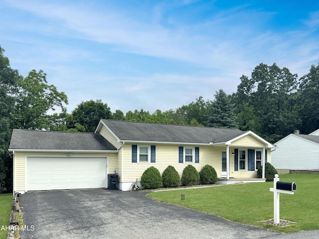 1647 Saint Francis Ln, Altoona, PA 16602 - ranch-style house with driveway, a garage, a front yard, and covered porch