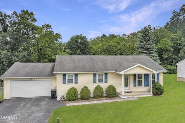 1647 Saint Francis Ln, Altoona, PA 16602 - single story home with a front yard, driveway, a porch, an attached garage, and roof with shingles